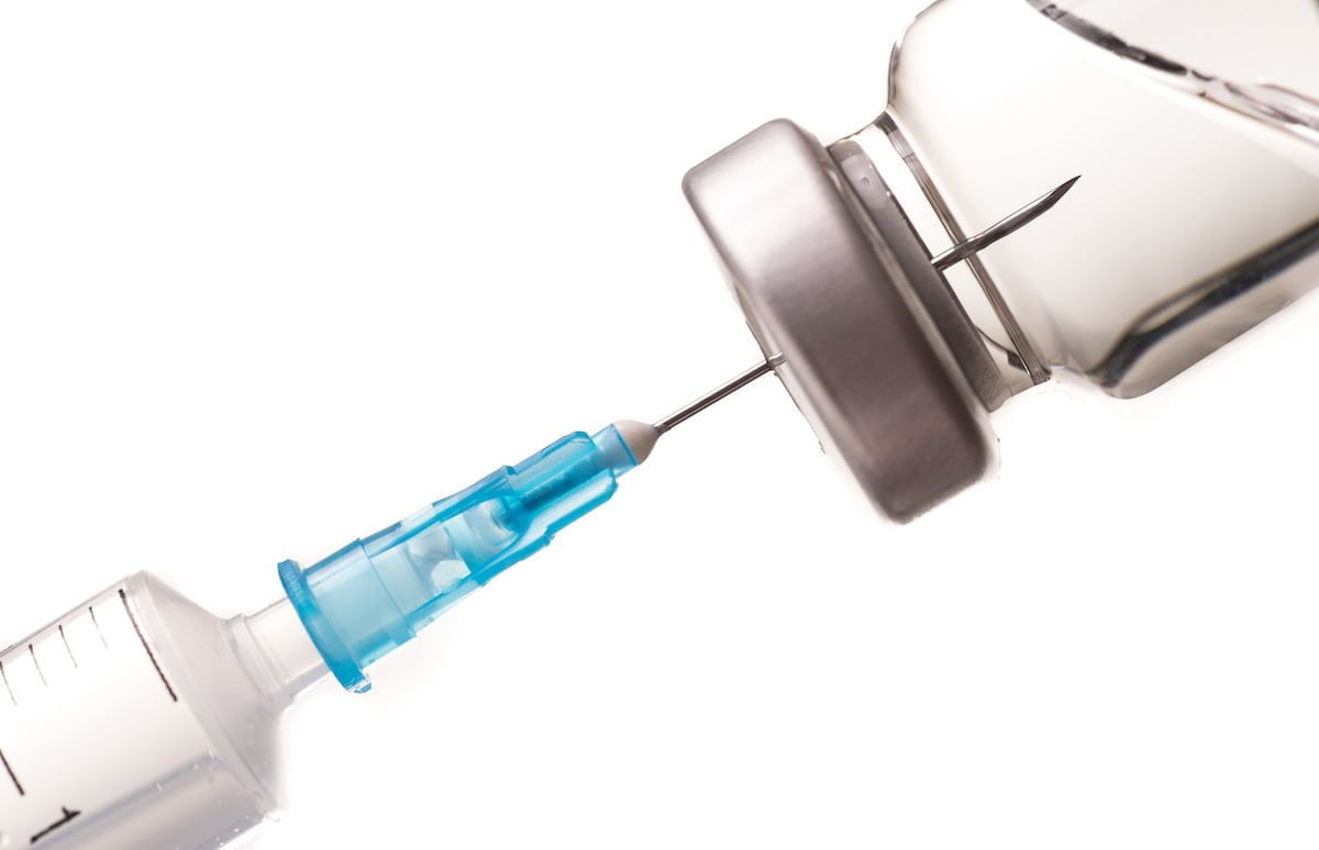 bottle of injectables and needle