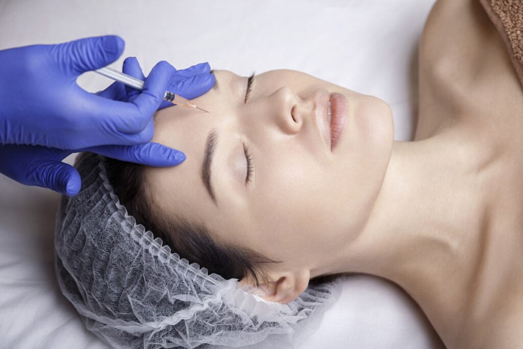 a woman receiving injectables