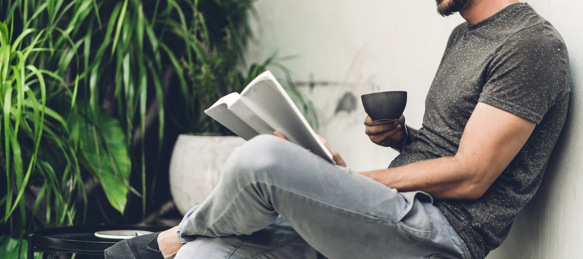 a man reading a paper