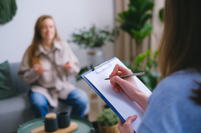 a patient smiling during a consultation