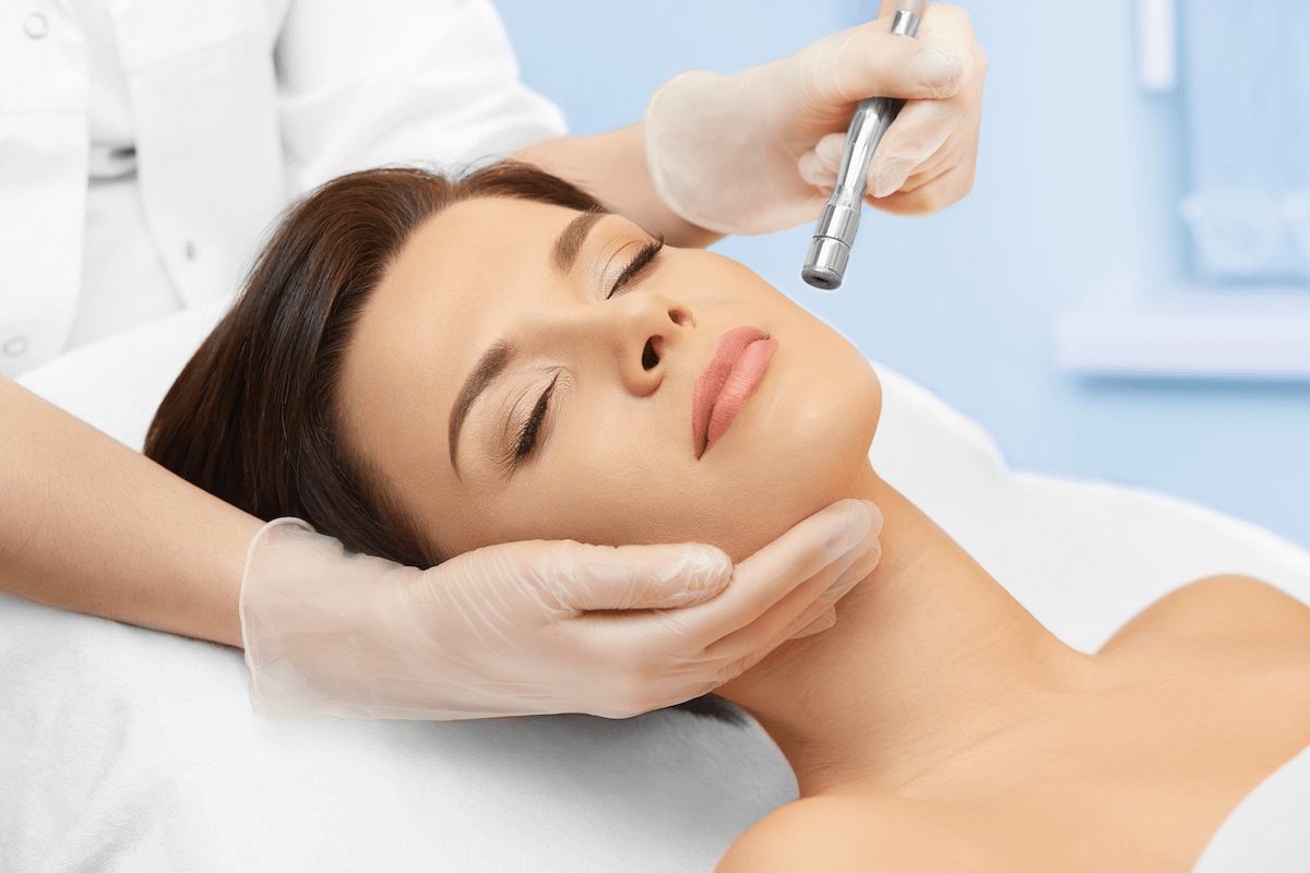 A woman enjoying a facial rejuvenation treatment in a MedSpa