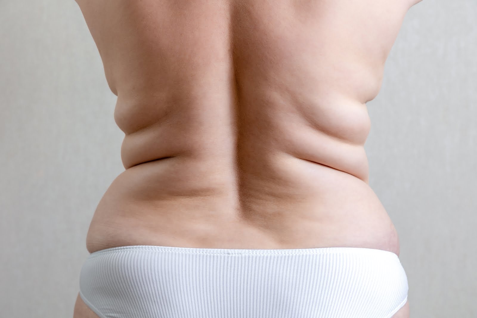 How to get rid of back fat rolls and loose skin on your stomach