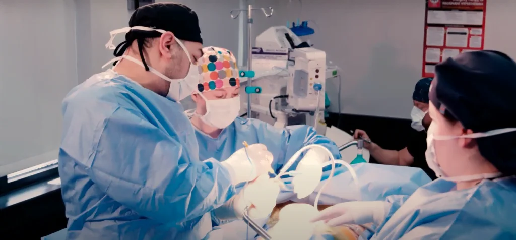 Dr. Saba doing body lift surgery surgery on a patient.