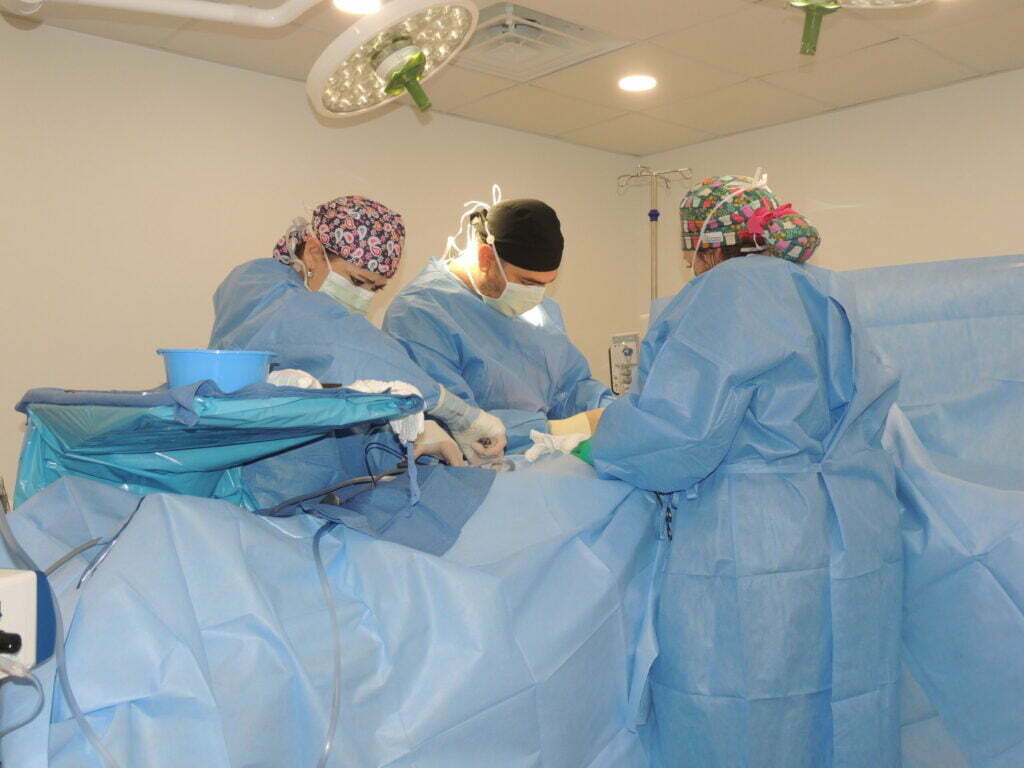 Dr Saba, performing implant removal surgery.